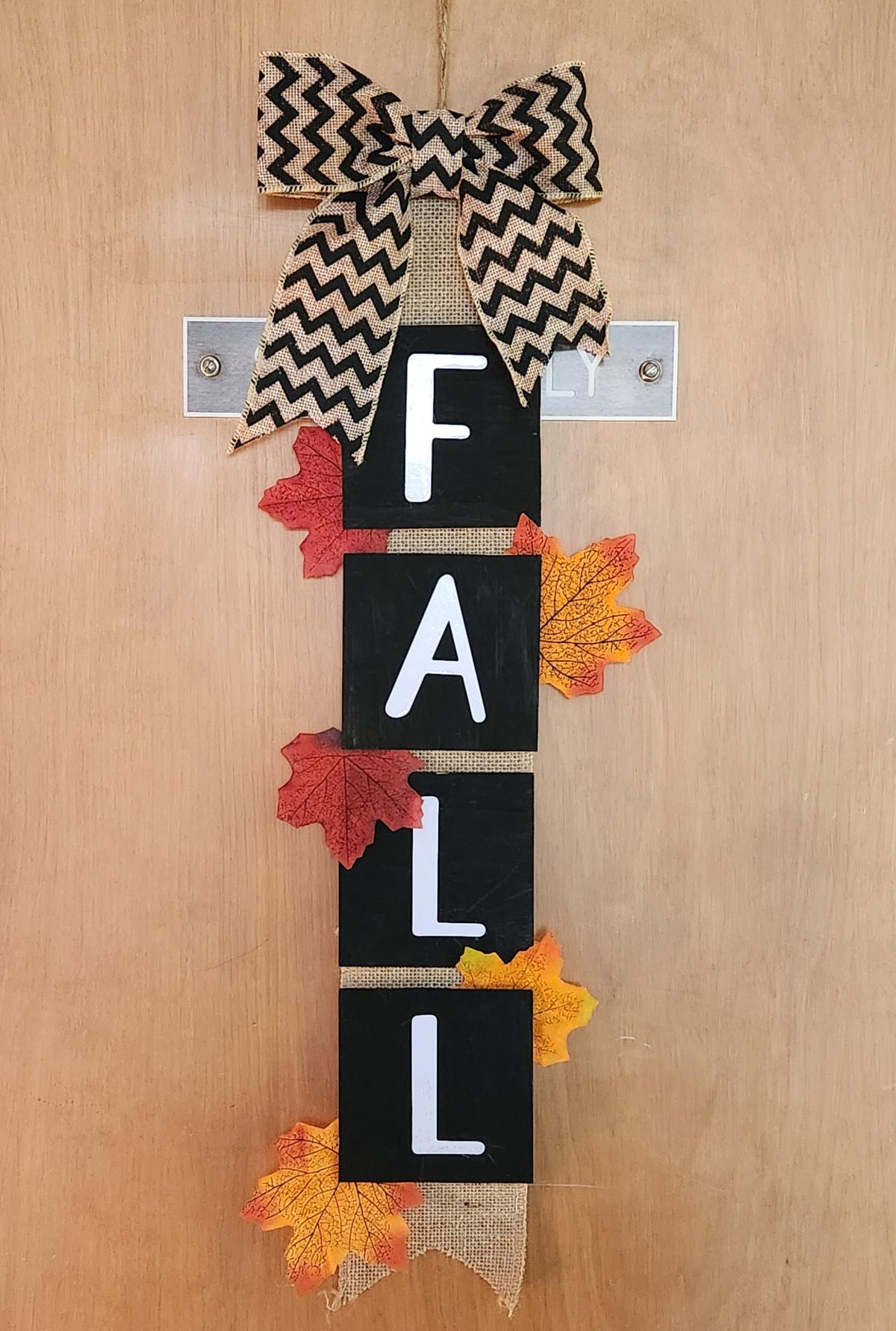 Fall door hanger