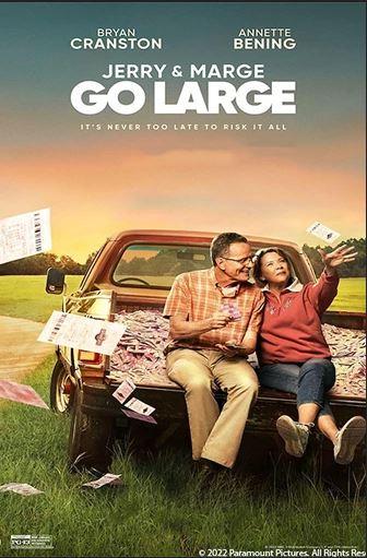 two people sitting in the back of a truck